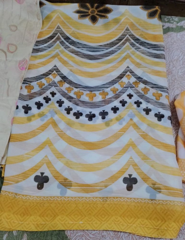Vibrant Yellow &amp; White Printed Dress Material