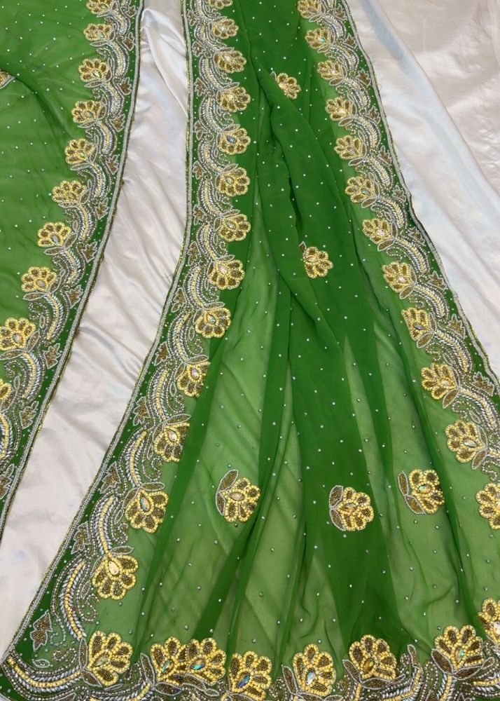 green embroidered saree