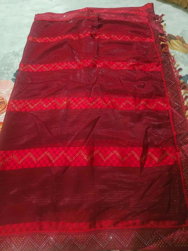 Elegant Red Saree with Gold Accents