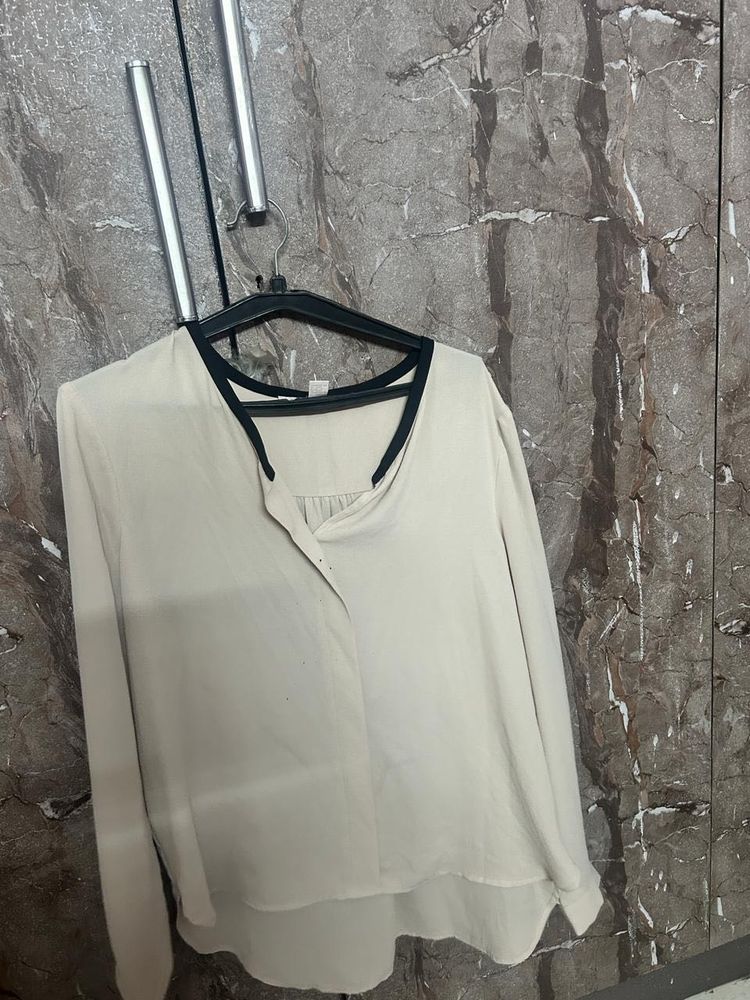 Elegant Cream Top with Black Trim
