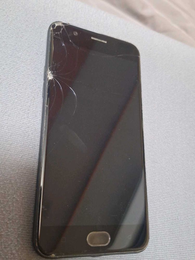 Oppo A57 Smartphone with Cracked Screen