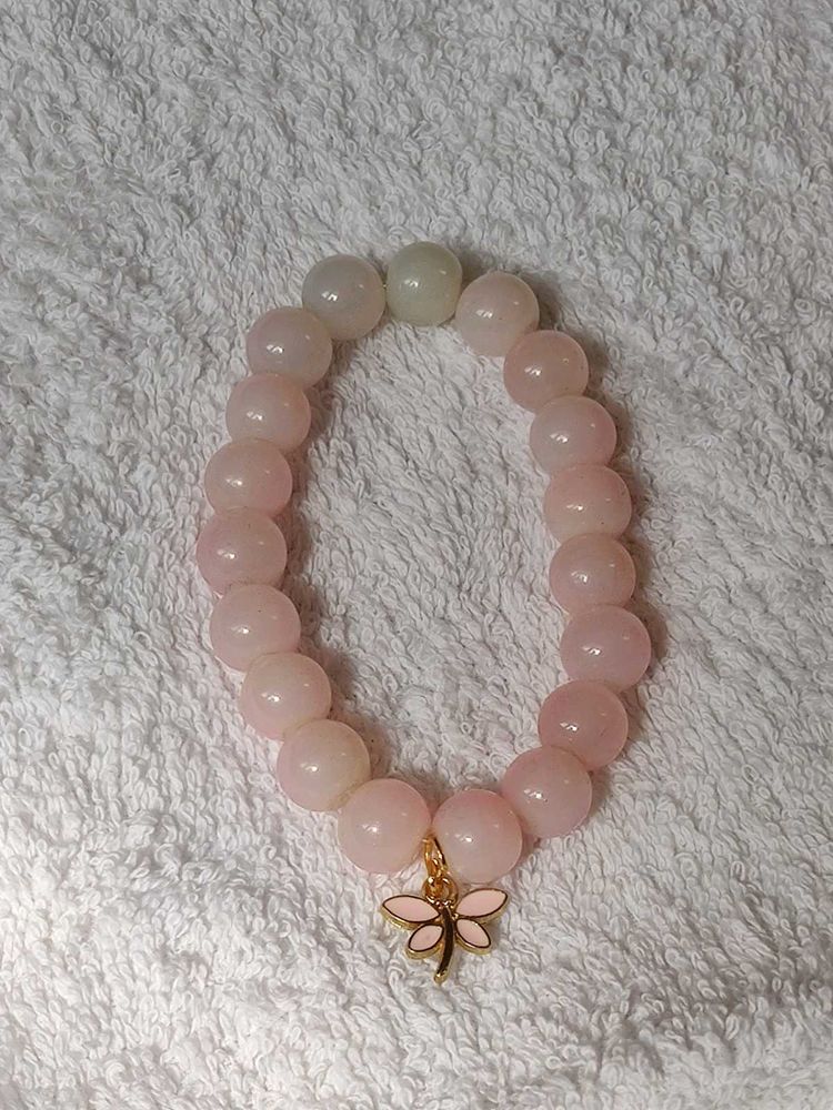 Pink Gemstone Bracelet with a butterfly charm