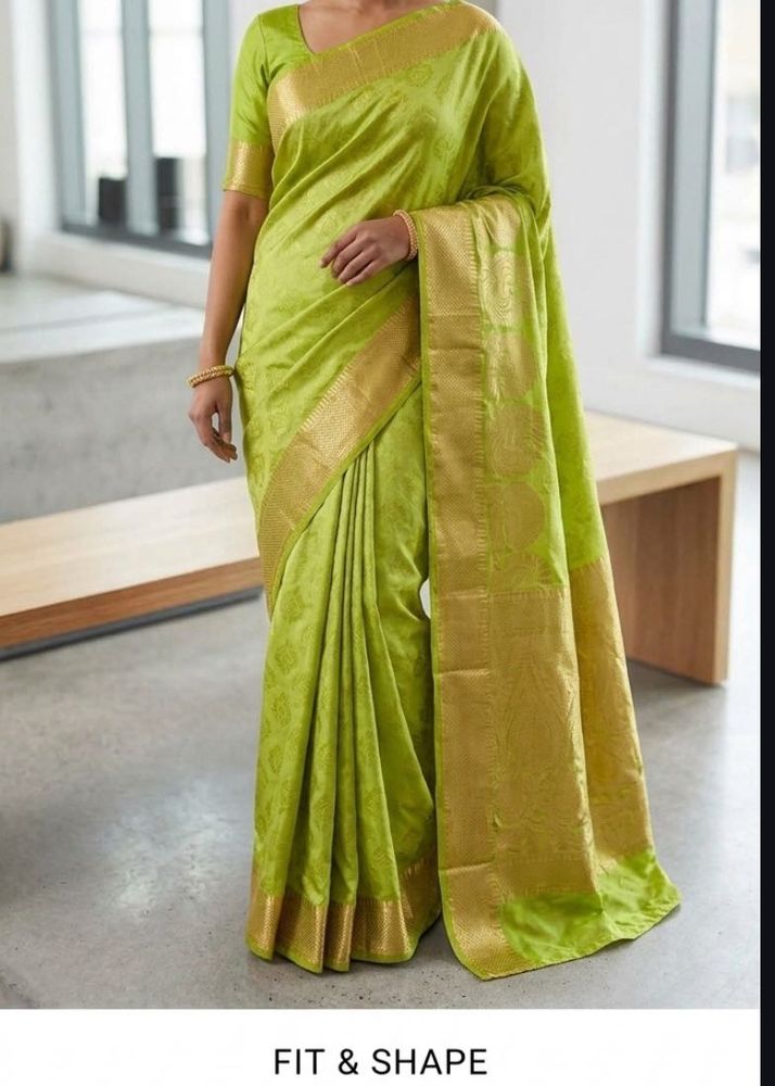 Vibrant Green Silk Saree with Gold Border