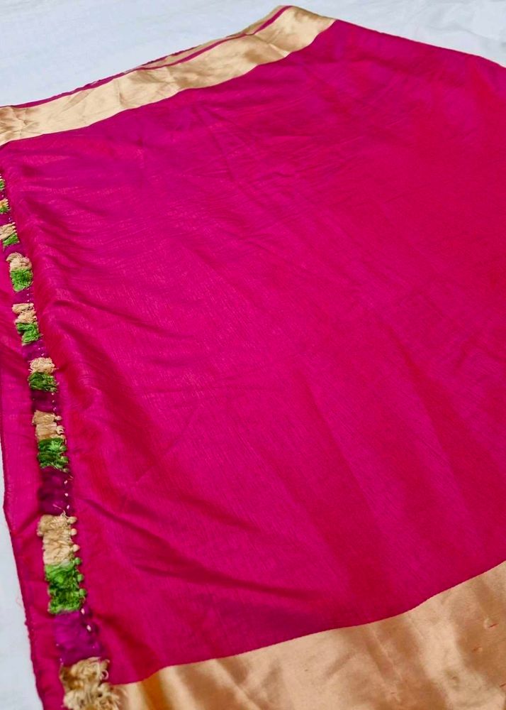 rani pink saree with golden border and tasels