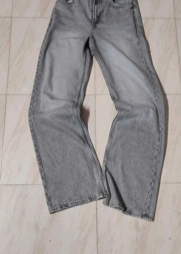 Grey baggy and bootcut jeans