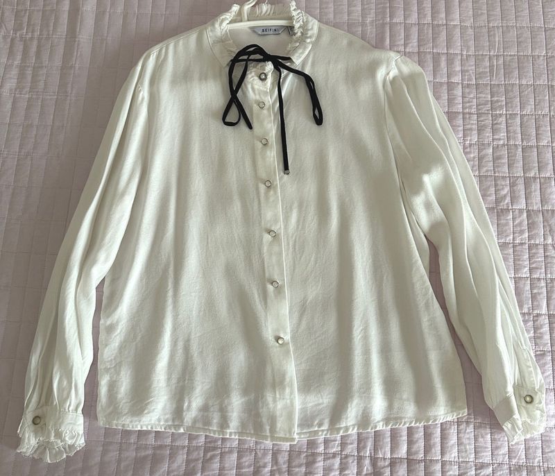 Chic White Blouse with Black Ribbon Detail🤍