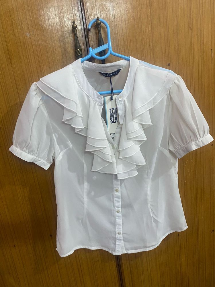 Elegant White Ruffled Blouse