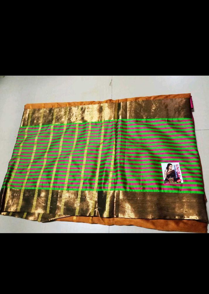 Vibrant Striped Silk green golden Saree