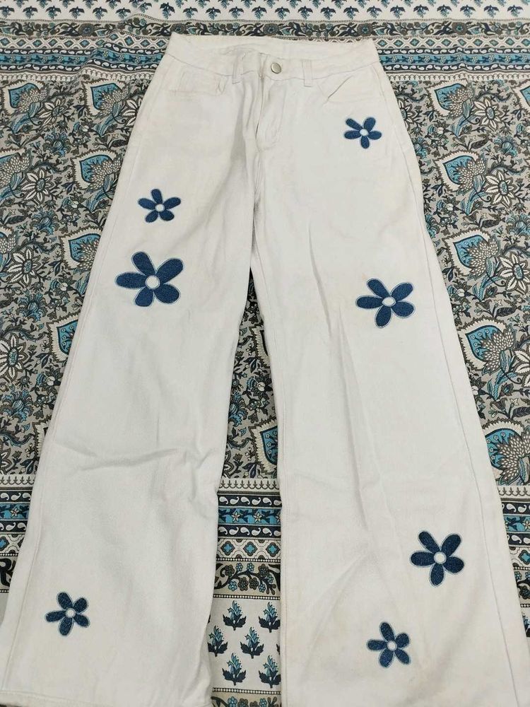White Flare Jeans with Floral Appliques