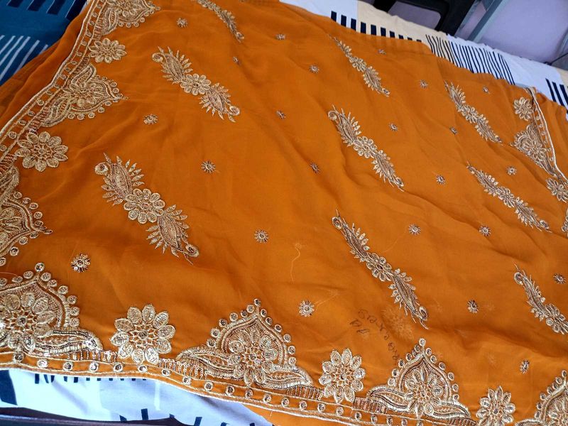 Elegant Orange Embroidered Saree