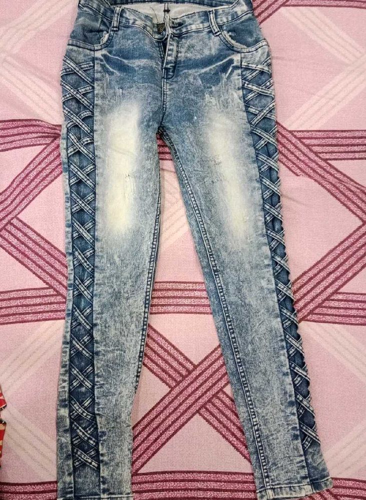 Distressed Blue Denim Jeans with Lattice Detail
