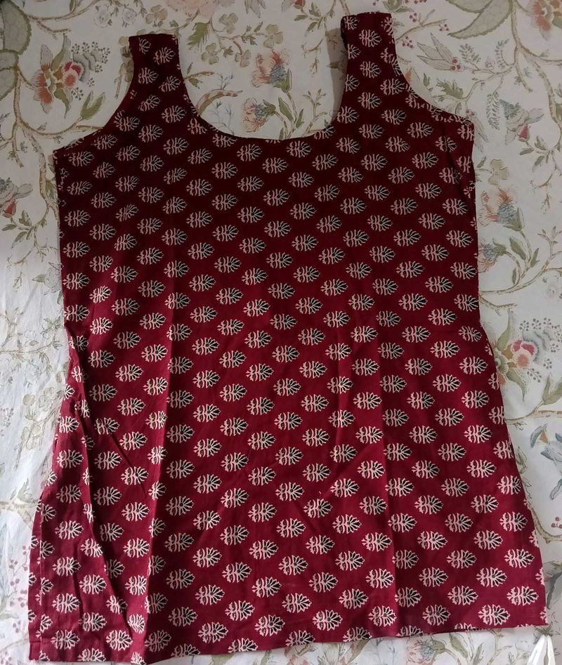 Maroon Printed Sleeveless  short kurti 👀