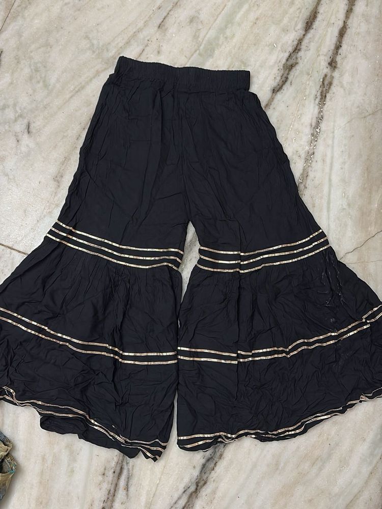 Stylish Black Palazzo Pants with Gold Trim