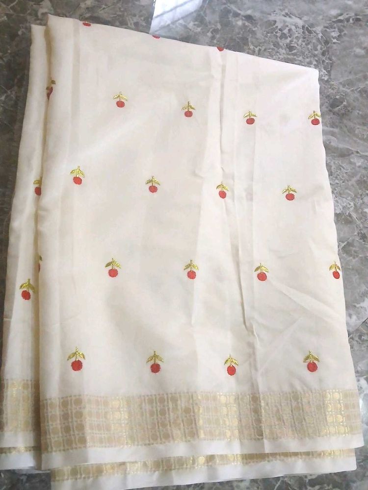 Elegant Off-White Embroidered Saree