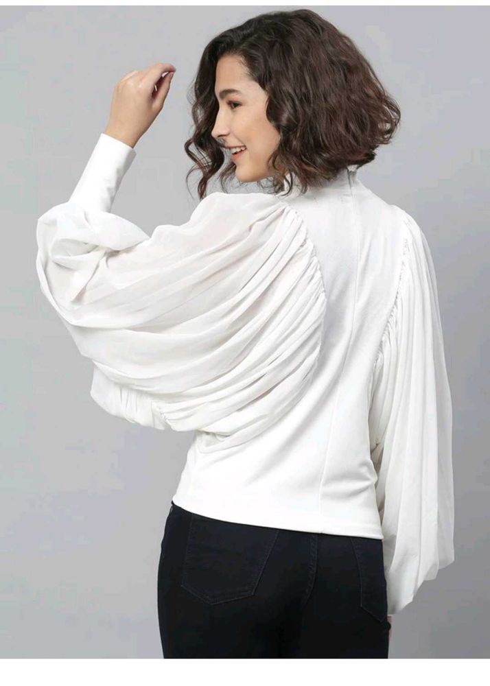 Chic White Blouse with Dramatic Sleeves