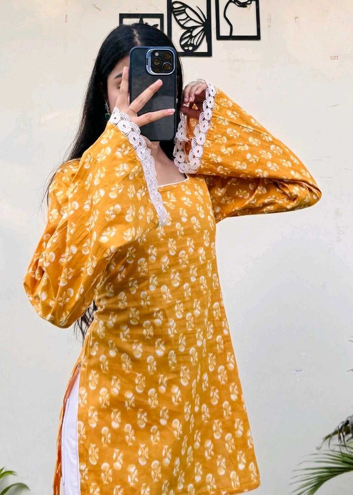 Pure cotton Yellow Printed Kurta with Lace Detail