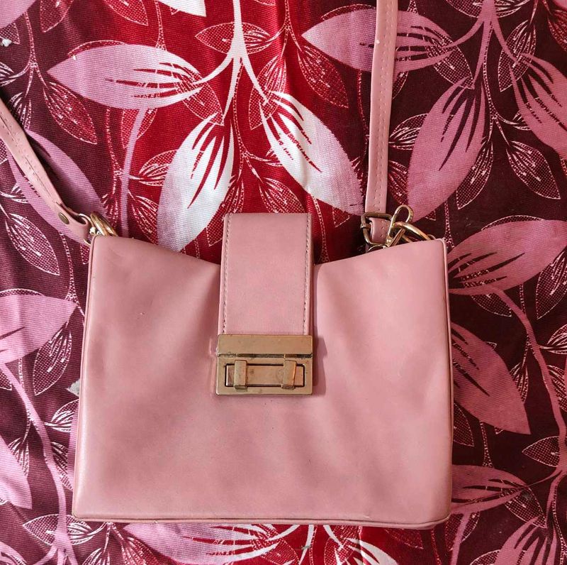 Chic Pink Handbag with Gold Clasp