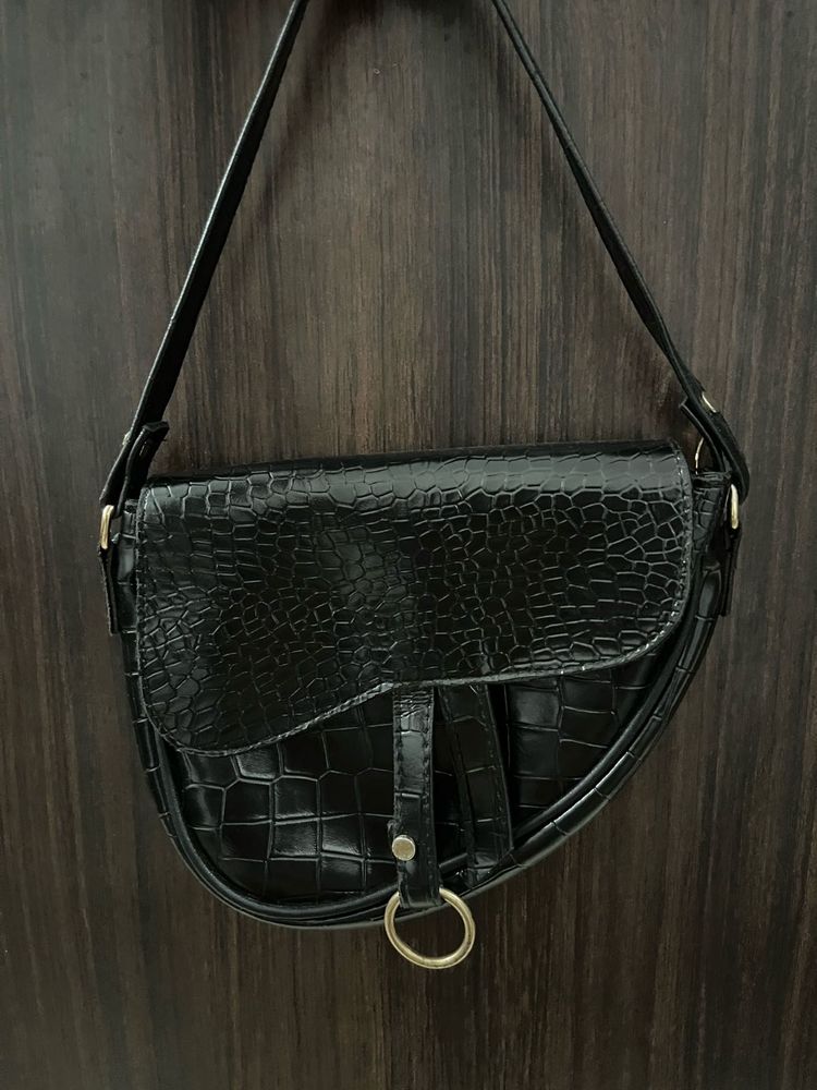 black textured shoulder bag