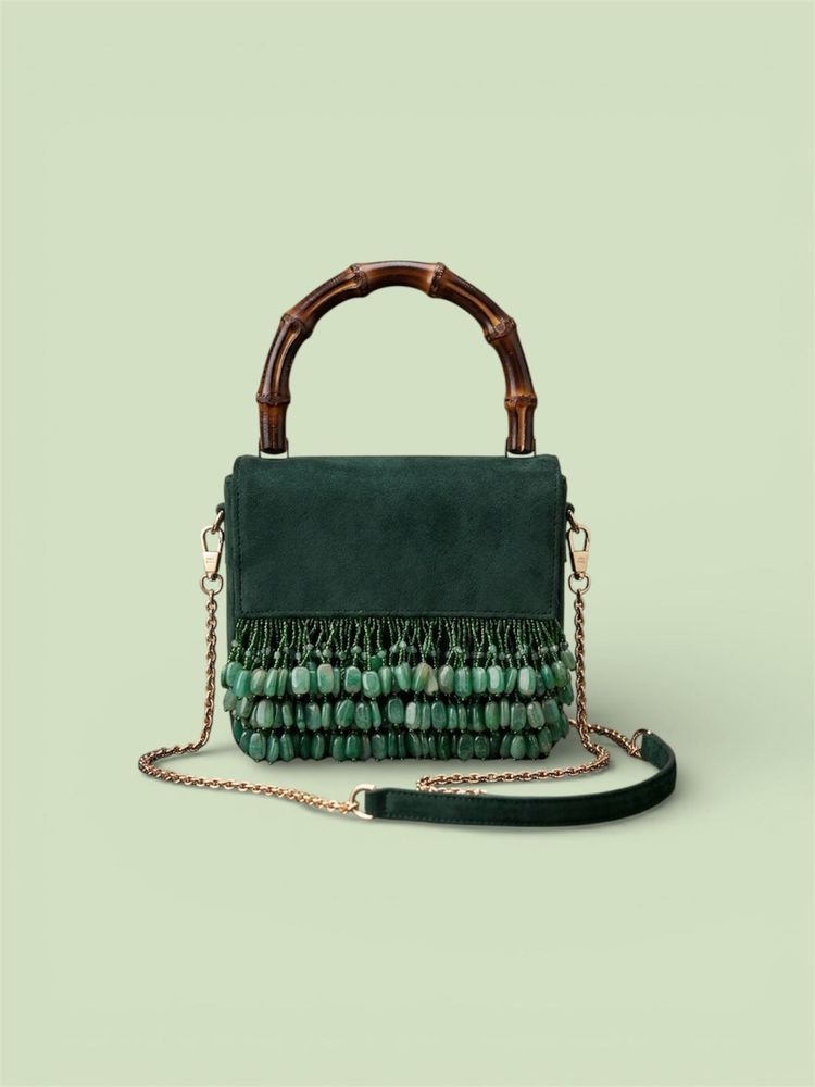 Elegant Green Suede Bag with Bamboo Handle