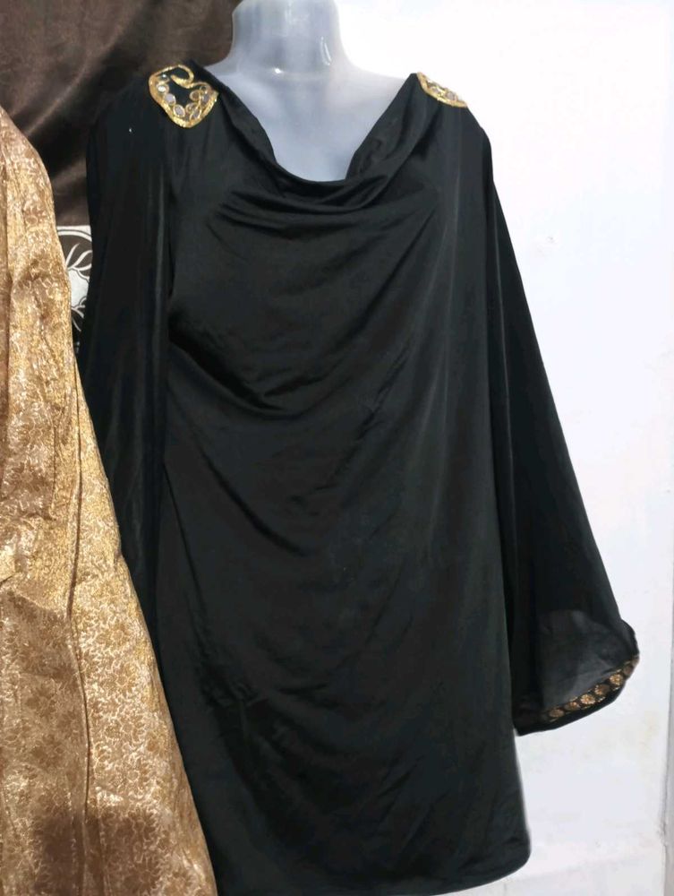 black kurti with golden lehga