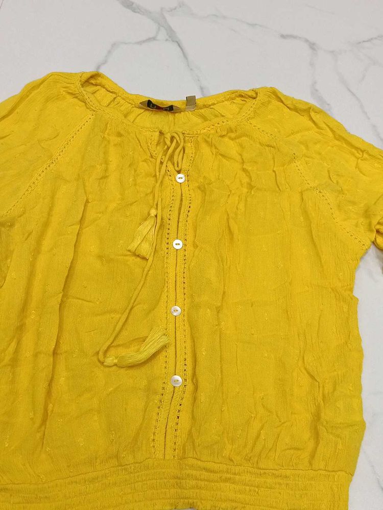 yellow blouson top