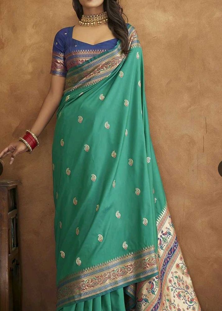 Elegant Teal Saree with Gold Border