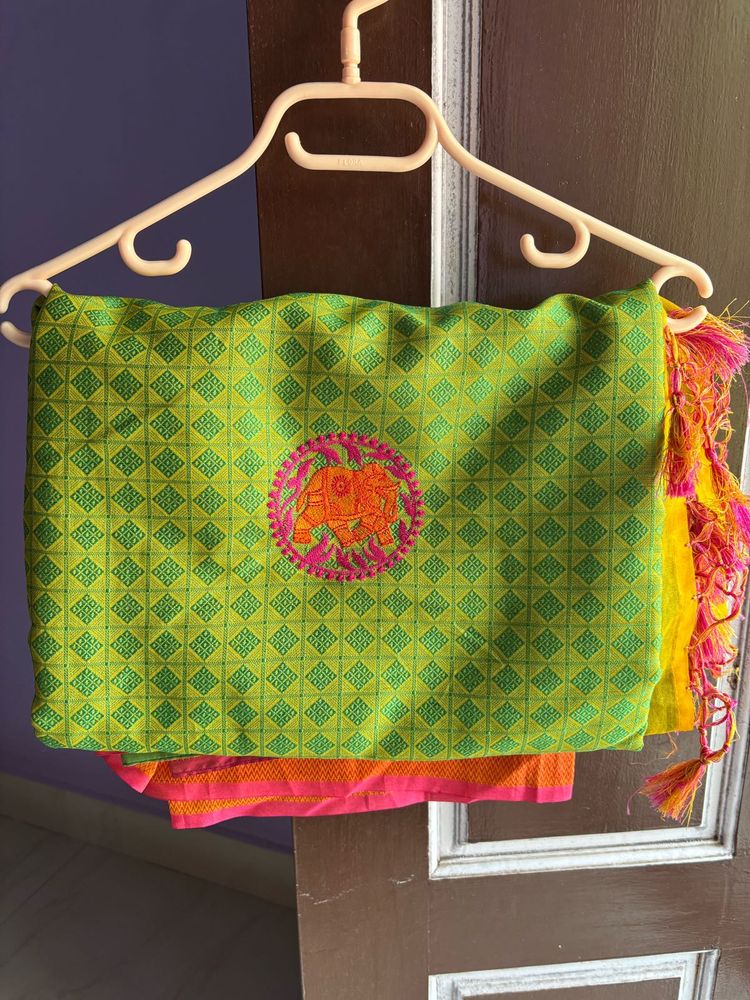 Vibrant Green Saree with Elephant Motif