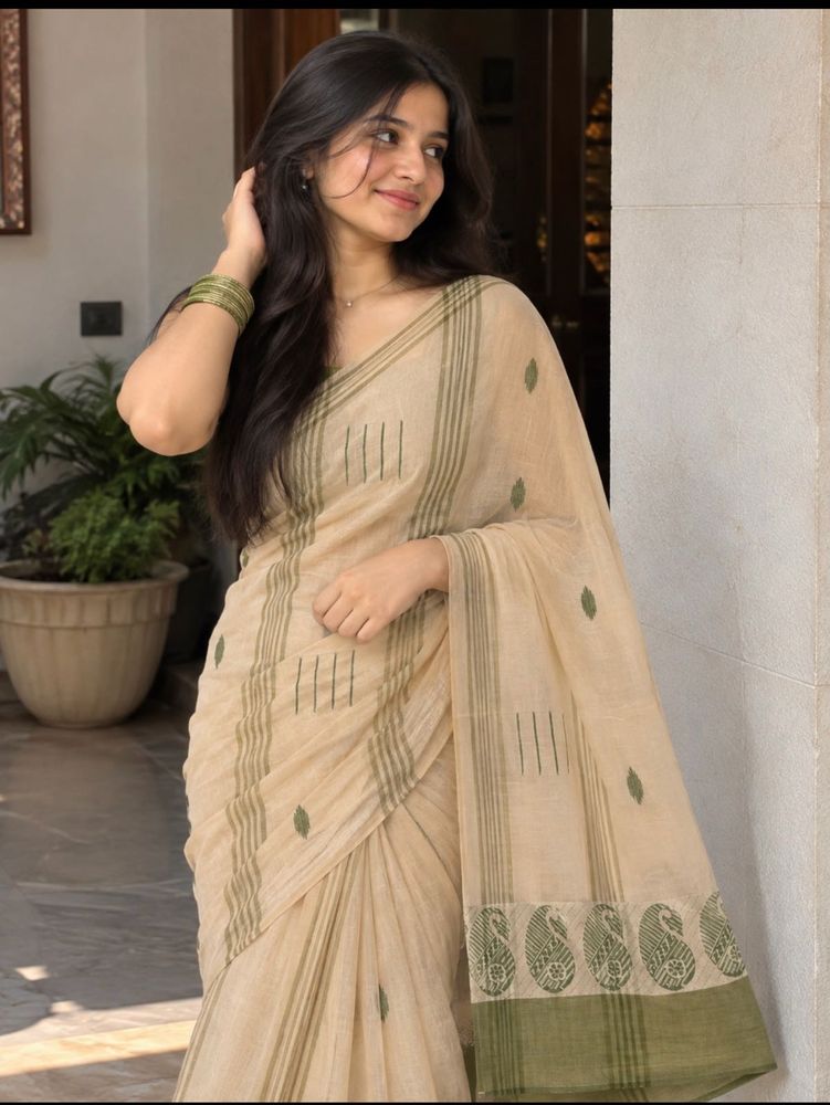 Elegant Cream Saree with Green Border