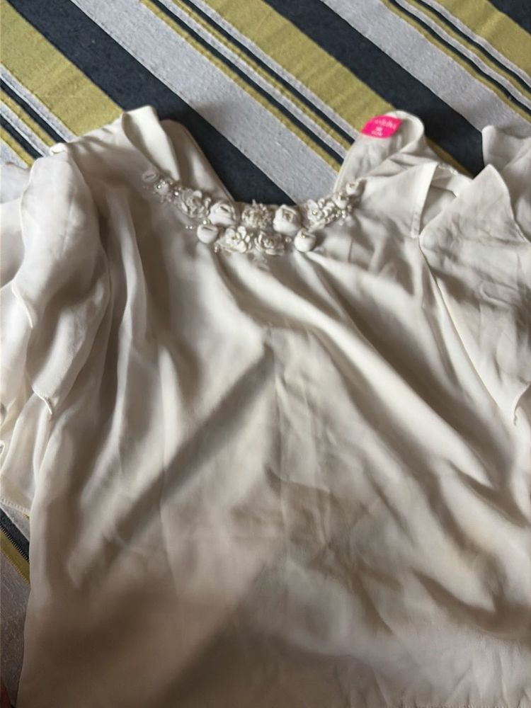 Elegant White offshoulder top