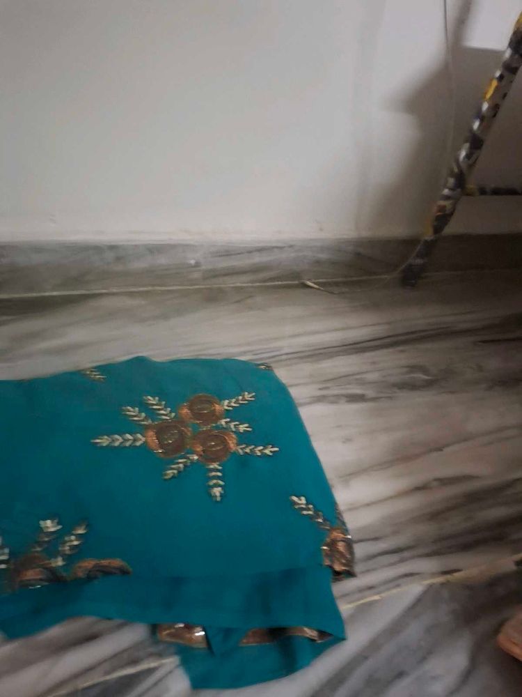 Beautiful Teal Saree with Golden Embroidery