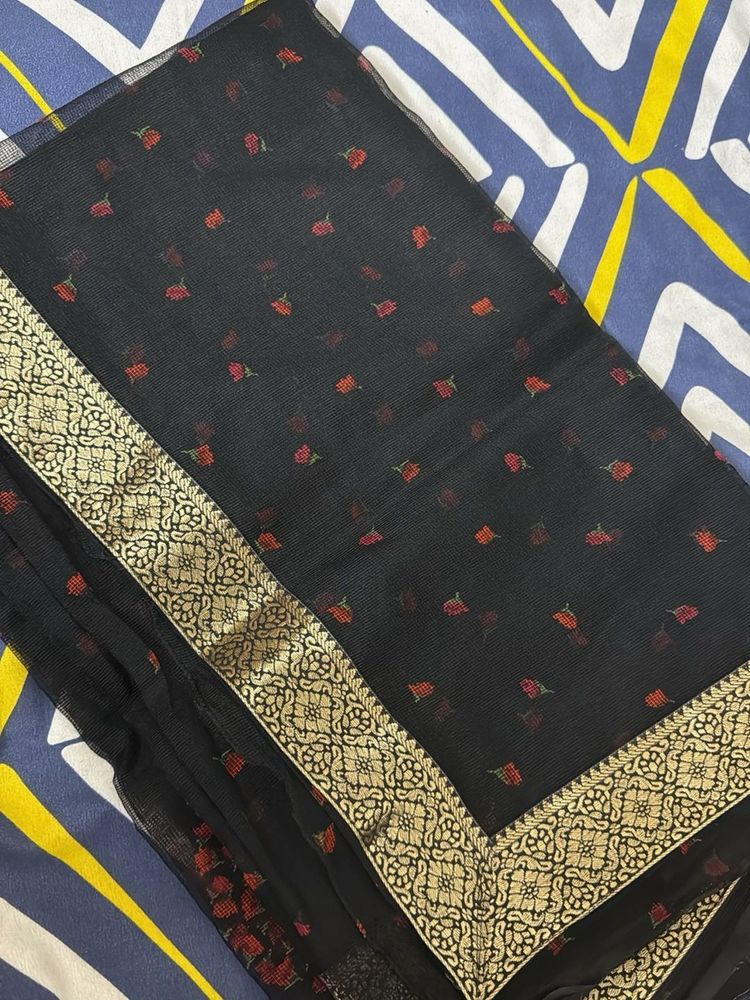 Elegant Black Saree with Floral Motifs