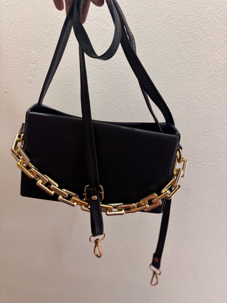 Chic Black Handbag with Gold Chain