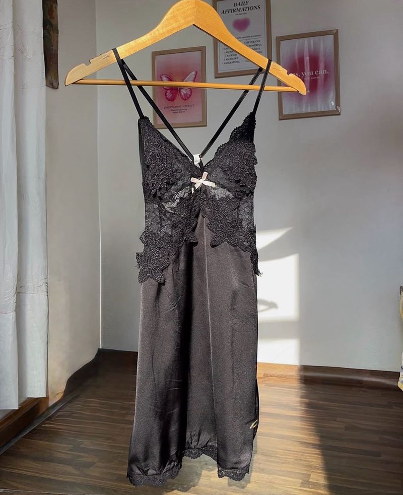 Black lace slip dress with criss cross back