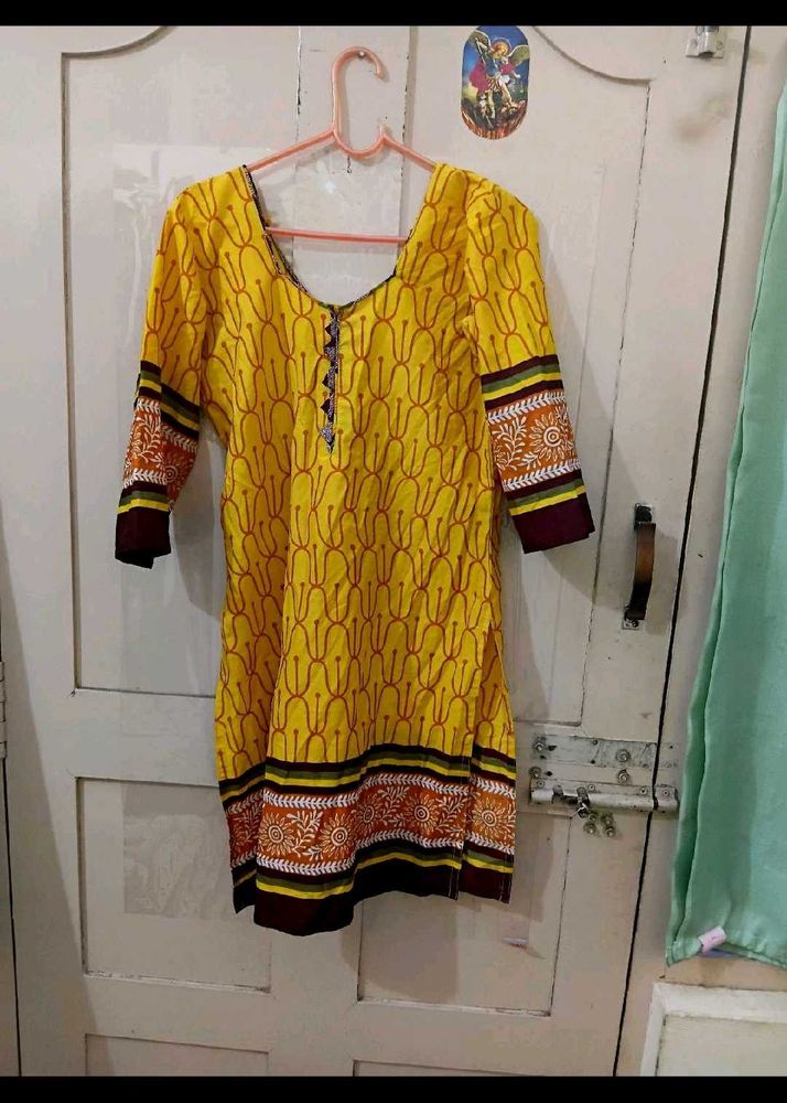 Beautiful yellow kurta with knot at back