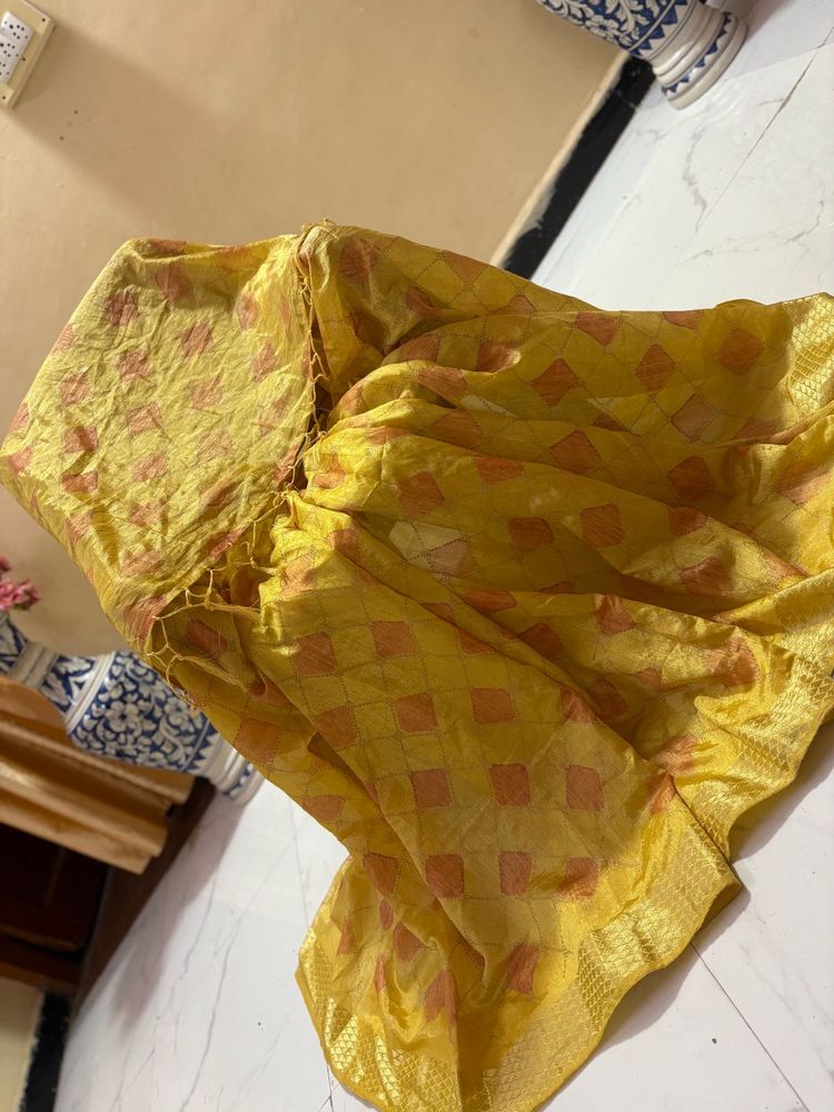 Vibrant Yellow Saree with Orange Motif