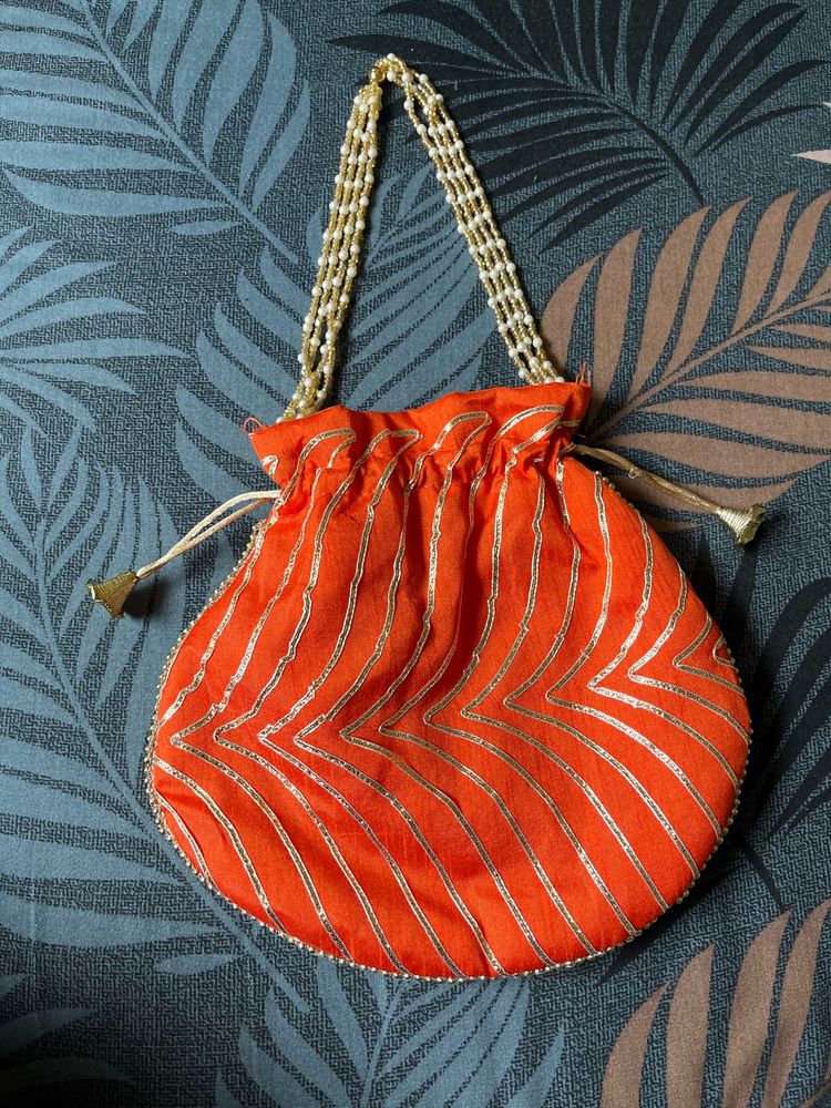 Elegant Orange Potli Bag