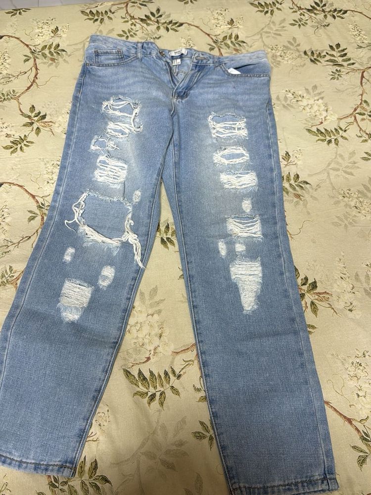 Distressed Light Wash Denim Jeans