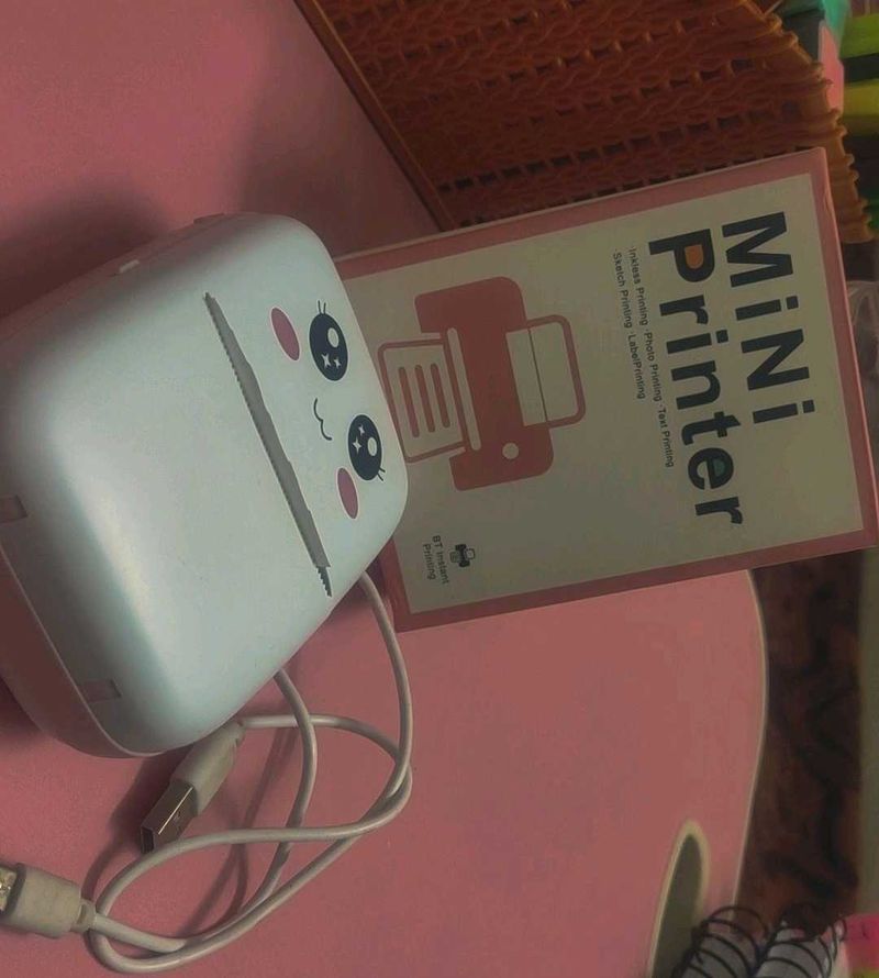 Mini Portable Chargeable Inkless Printer.