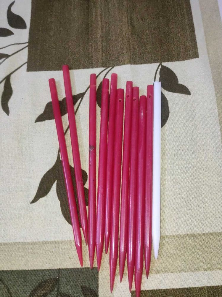 Eleven plastic hair sticks for bun (juda)