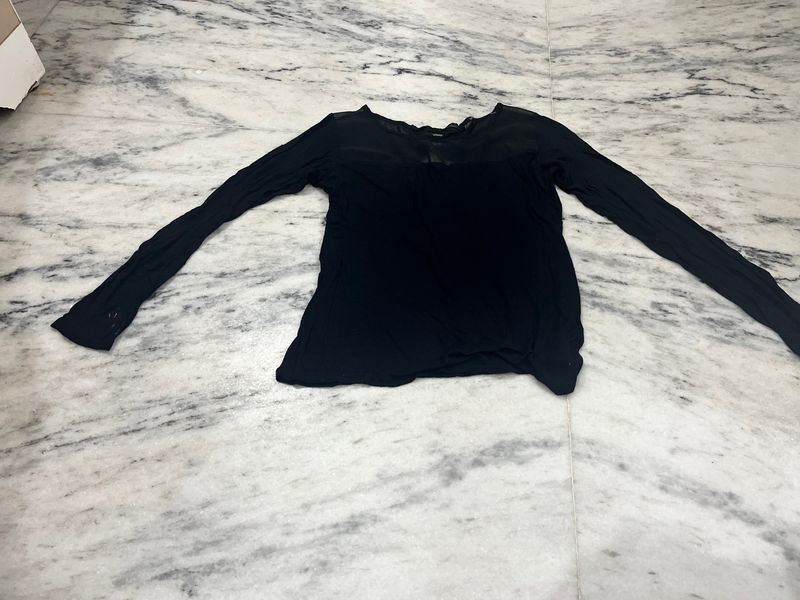 Black Top With A Net Neckline