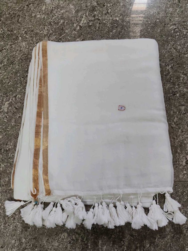 Elegant White Saree small zari border with Tassels