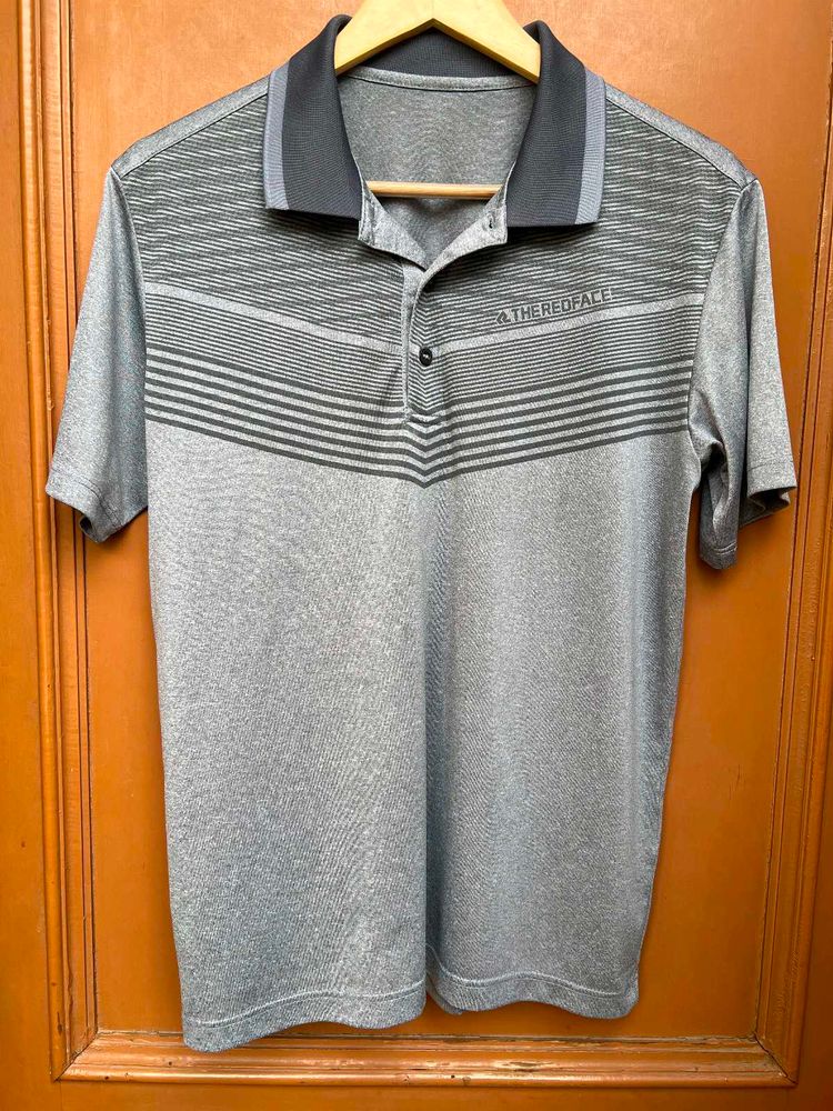 Red face performance polo
