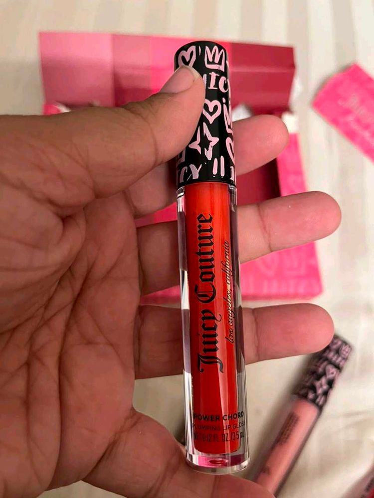 Juicy Couture plumping Lip Gloss