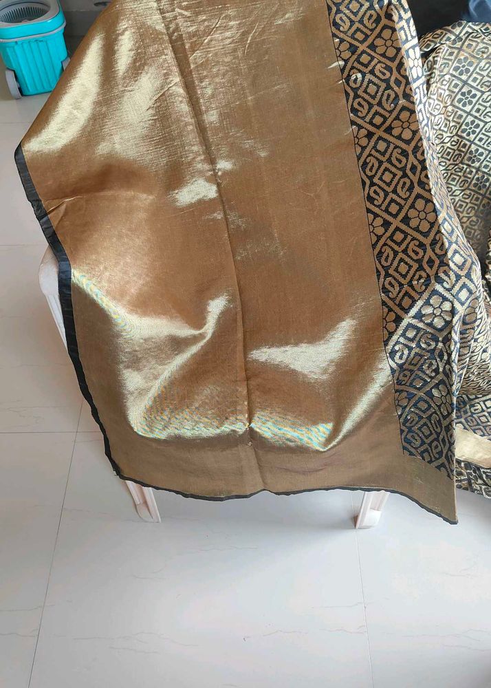 black and golden combination saree