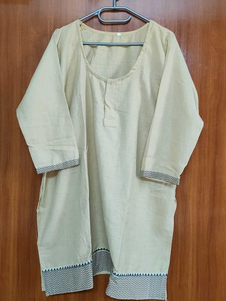 Elegant Beige Kurta with Zigzag Trim