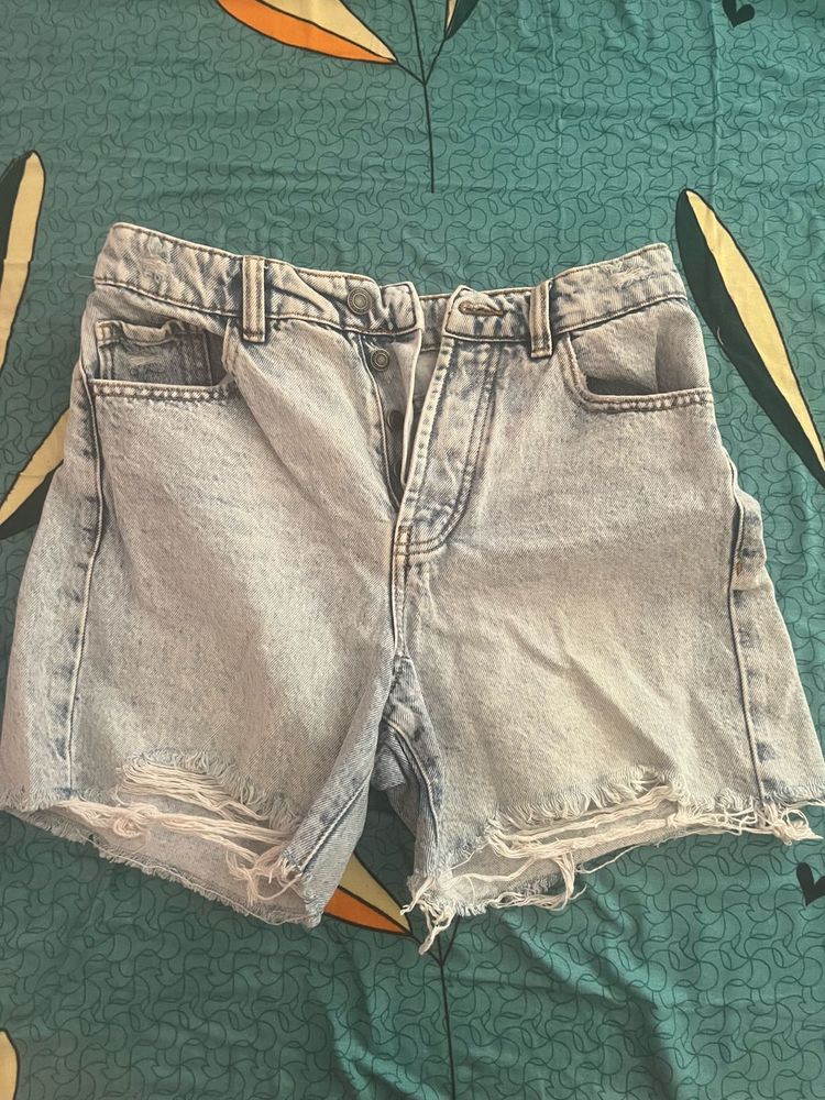 light washed distressed denim shorts
