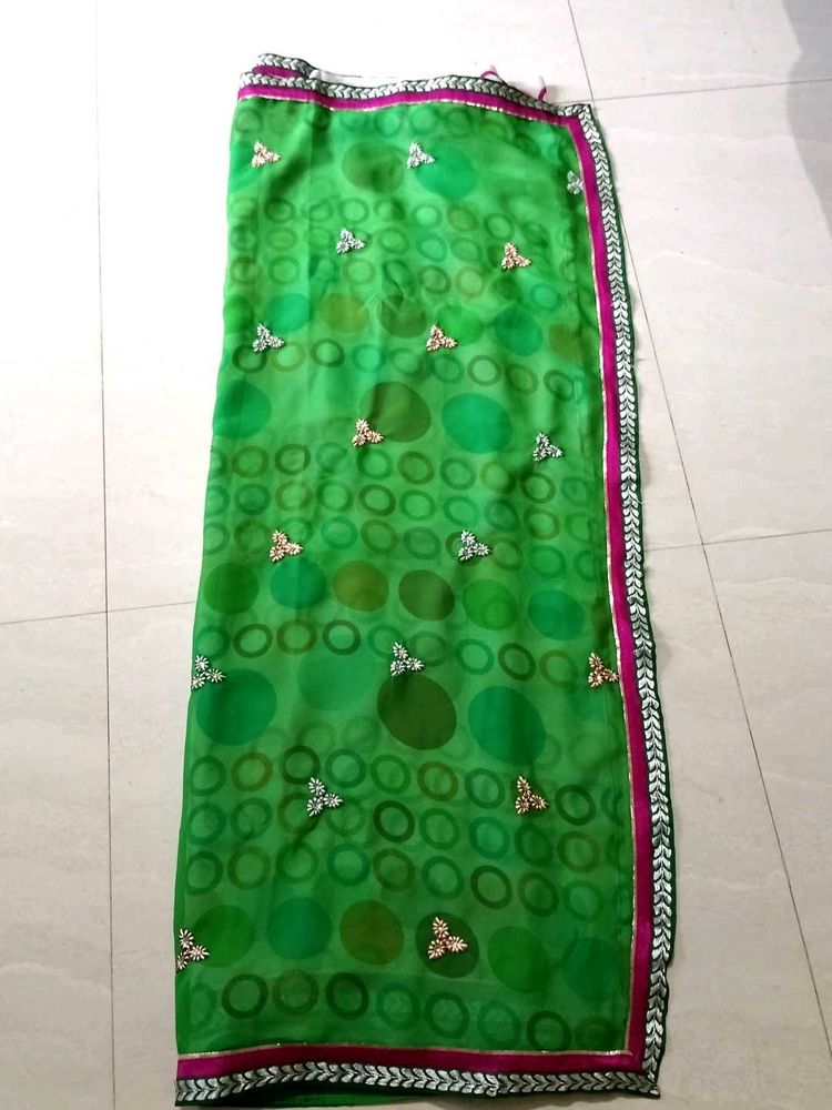 Beautiful Green Saree with Embellishments