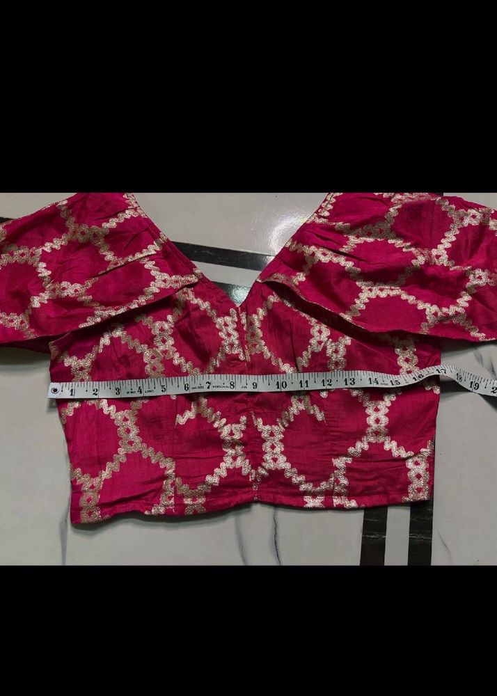 Designer Pink Blouse with Gold Print and necklace