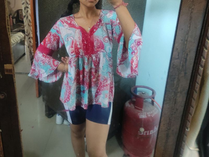 Peplum Top Combo Umbrella Sleeve .