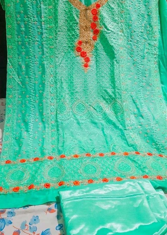 Elegant Green Kurta Set with Orange Embroidery wit